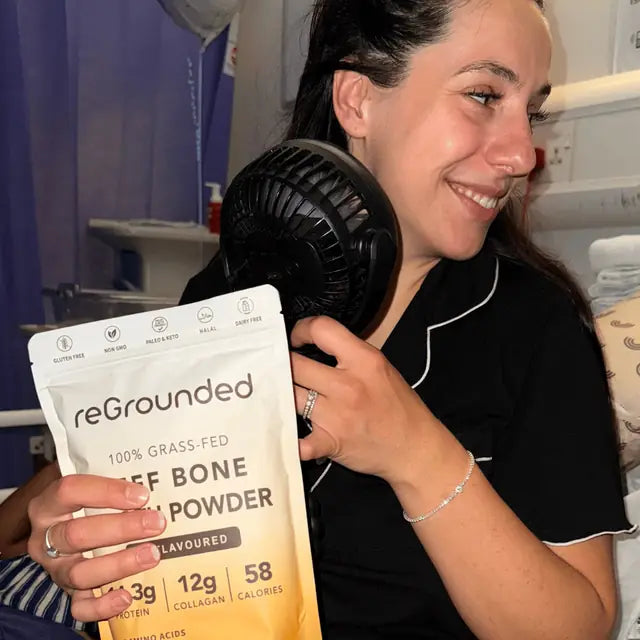 reGrounded customer smiling with her beef bone broth pouch